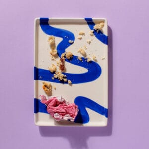 Cake Club The Big Sultana scone crumbs on a modern blue and white plate – finished and enjoyed.