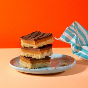 The Millionaire shortbread traybake slices with gooey caramel and chocolate drizzle | Cake Club.
