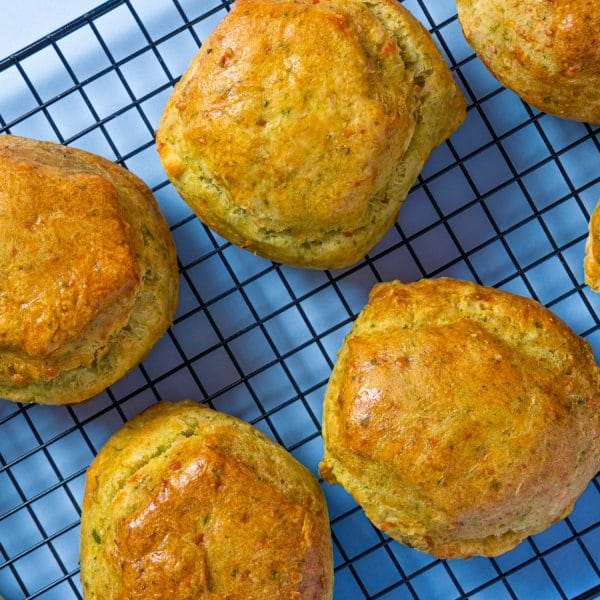 Spinach and Feta Scones arranged neatly on a cooling rack.