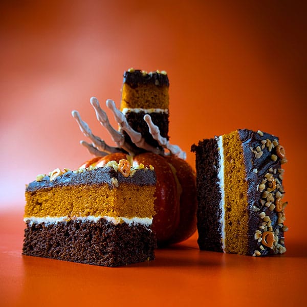 Chocolate praline pumpkin traycake with cream cheese icing and sprinkles – cakes for coffee shops UK.